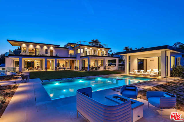 1130 Carolyn Way Beverly Hills, California Soaring above Sunset with jetliner views from Downtown to the ocean, this newly built contemporary estate showcases unprecedented finishes and resort-like grounds in one of the worlds most coveted neighborhoods. Open, light-infused living spaces, including an exceptional chefs kitchen, are lined with Fleetwood walls of glass, fostering a harmonious connection to phenomenal grounds, including a heated loggia, kitchen, sprawling lawn, pool, spa and luxury cabana. 4,000 SF of balconies and decks include a rooftop lounge with nearly 360-degree panoramic views. The gorgeous master suite boasts a sitting area, dual baths, showroom closets and wraparound terrace. A daylit entertainers level holds a great room with bar, tiered theater, fitness studio with steam and sauna, temp-controlled wine room, kitchenette and maids quarters. With full Crestron automation, a six-car auto gallery and elevator, this home offers a rarified living experience moments to Beverly Hills Hotel and Rodeo Drive.