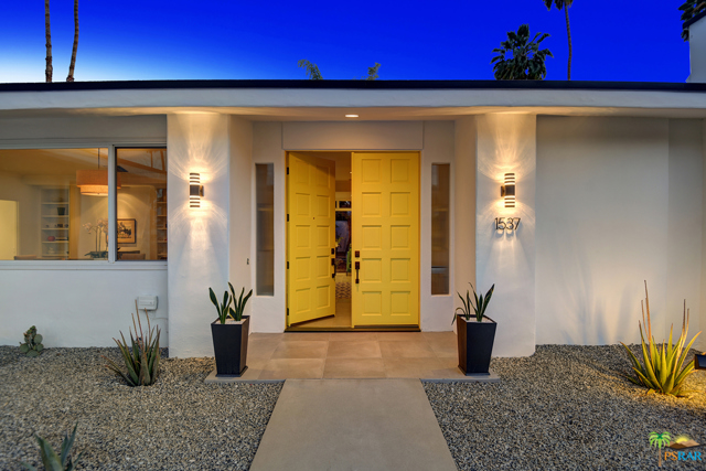 1537 Chico Circle Palm Springs, California Beautiful custom built home on FEE land in the Indian Canyons on a quiet cul de sac offers you privacy and amazing mountain views. The covered patios on the east and west ends of the home flow nicely to the spacious well manicured grounds and new pool and spa. As you enter through the canary yellow double doors, the spacious entry offers a view of the court yard garden. On the left is a formal dining room with built ins. On the right is the oversized living room with a marble gas fireplace and french doors that lead out to the patio and pool. Running nearly the full length of the home is a long wide gallery hall way with a powder room, and the entry to two ensuite bedrooms, ( 1 with a sauna). A third bedroom with an adjacent full bath make this 3 bedroom, 3 1/2 bath the perfect layout for all. The newly remodeled kitchen offers new cabinets, Quartz counter tops, and stainless steel appliances, along with a bonus area that could be a family room or a casual eating area. Newly painted inside and out, new foam roof, new tile and carpet, and a 3.5 KW solar system makes this home ready for you to experience the Palm Springs life style at its best.