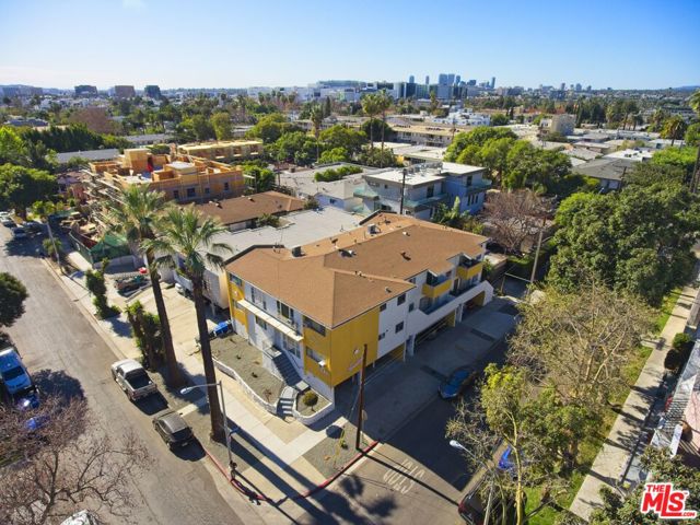 561 N Sweetzer Avenue West Hollywood, California On offer is a charming 9 Unit Apartment Building in a great location of West Hollywood. The building features one 3 bed, one 2 bed & seven 1 bed homes w/ large windows & some with outdoor space. Building has 8 parking spaces. 3 units have been completely remodeled w/ updated plumbing & electrical, new windows & sliding doors, recessed lighting throughout w/ a new split system AC in the bedroom & living room. Shaker kitchen cabinets, quartz countertops, ss appliances, laminate wide plank flooring, tiled bathroom floors & large walk in shower with frameless glass. Exterior upgrades include seismic retrofit done in 2020, fully repainted, original signage restored & painted, stairwell & exterior floors & railings sealed & painted, new drought tolerant landscaping & new exterior light fixtures. Walk to the trendiest intersection in LA at Melrose & La Cienega. Eat at the best restaurants & shop at the best stores that this Walkers Paradise has to offer. Great visibility on a corner lot.