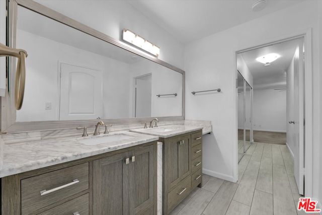 Primary bathroom facing bedroo