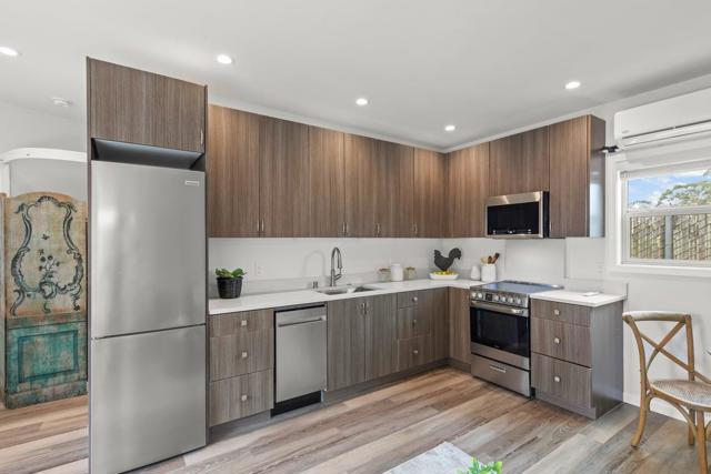Full kitchen, plent of cabinet space, stove, fridge, microwave and dishwasher. 