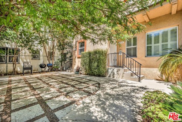 1073 S Mansfield Avenue, Los Angeles CA: https://media.crmls.org/mediaz/4959c978-f2ae-4bad-a709-da750b6e75a7.jpg