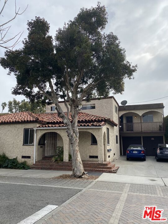 Front house is 4+2.75 with 1,800 sq. ft; back house 3+2 with 750 sq ft; Unit A above garage is 350 sq ft; Unit B above garage 350 sq ft. Buyer to independently verify square footage of each unit. Showing with accepted offer. Do not disturb  tenants. Do not trespass on the property.