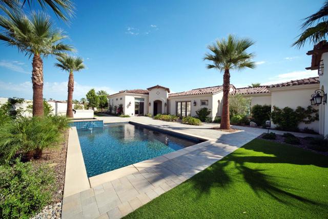 This gorgeous former Signature Home inside Toscana Country Club boasts over 3,000 sq.ft. of living space atop an oversized homesite of over 16,000 sq.ft. for the ultimate luxurious desert lifestyle. Finishing touches for this home include high-end furnishings, window treatments, and lighting; air-conditioning in the garage; automatic shades in the main areas of the home; and more, while the custom pool, spa, and built-in grill in the spacious courtyard provide outdoor living and entertainment space.Inside the open-concept great room, the bright neutrals are showcased by the soaring pocket doors that allow for ample natural light. A floor-to-ceiling accent wall surrounding the fireplace and entertainment center, classic-contemporary chandelier over the dining area, and plank flooring with textured area rugs provide a designer feel. The gourmet kitchen with breakfast bar provides abundant storage within the beautiful, dark cabinetry, as well as considerable quartz countertop space for dinner party preparation. The kitchen also features a stunning gold and white-tile backsplash, and modern SubZero Wolf stainless steel appliances. Retreat to the master suite that offers a resort-like en suite featuring His & Hers large vanities, stand-alone soaking tub, glass-surround walk-in shower, and walk-in closet. Guests can relax in either of the main-home guest rooms or the private guest house.This home has a Golf Membership available for purchase with the home.