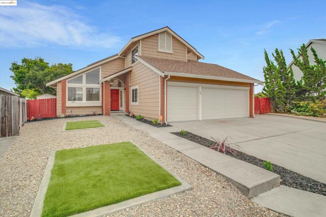 View of front of home with driveway, brick siding, an attached garage, and a shingled roof