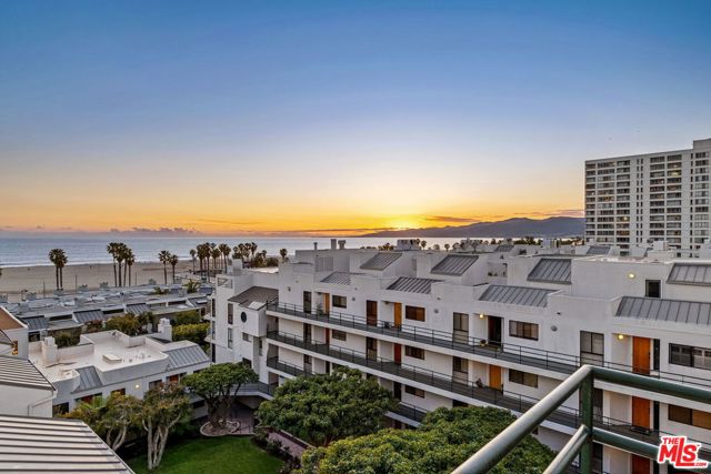 2950 NEILSON Way 601 Santa Monica, California Breathtaking modern Penthouse home with expansive ocean and mountain views up the Santa Monica coast. This prized and unique floorplan with two bedrooms plus loft features incredible views from every room. Soaring ceilings, skylights, and sliding glass doors make this light, bright and airy space the perfect luxury beach unit. Top-of-the-line 2019 remodel features a new custom chef's kitchen with views over prime Main Street and city lights. Gorgeous new hardwood floors throughout. Sexy and soothing Master Suite. Sought-after loft space with private open patio offers stunning panoramic views. Private laundry in unit. 2 side x side gated parking, plus additional guest parking. Prestigious complex offers 3 spas and pool, gym, rec space, and an on-site manager. Security and concierge. Top-of-the-world living in dreamy Ocean Park.