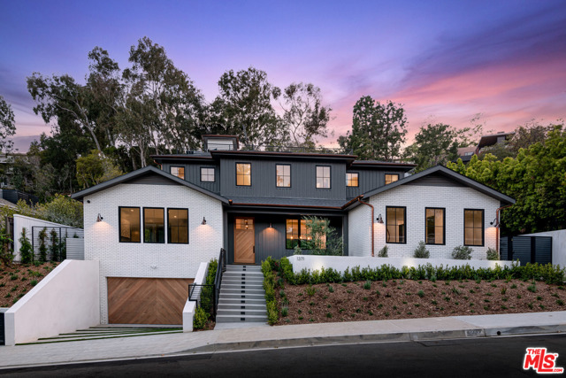 1371 Marinette Road Pacific Palisades, California Enjoy the ultimate in Southern California living in this brand-new construction Modern Farmhouse, built by Shelter Homes! Ideally located near Palisades Village, yet with privacy and an oversized lot (13,000+ sq ft), this 6 bedroom and 9 bath home is everything you have been looking for and more. Exceptionally designed with every detail in mind, you will find stunning finishes and custom fixtures throughout. The main floor features a gourmet kitchen and breakfast area, living room with private patio, dining room and family room, walk-in pantry, butlers pantry, laundry & 1 en-suite bedroom that open out to the large yard. The yard is expansive & perfect for entertaining with a large pool and spa, tons of grass, BBQ, fire pit, and an outdoor lounge and dining area. Upstairs you will find 4 en-suite bedrooms including the master suite with 2 walk-in closets, a fireplace, and a balcony. This home features entertaining areas abound, from the sprawling backyard to the rooftop deck (with elevator access) where you can enjoy the ocean view or a starry night sky and a lower basement level with movie theatre, gym, wine cellar, mudroom, powder bath with steam shower and 1 additional en-suite bedroom. 1371 Marinette strikes the perfect balance between private oasis and convenience. A true one-of-a-kind, can't miss property in the best location in the Palisades