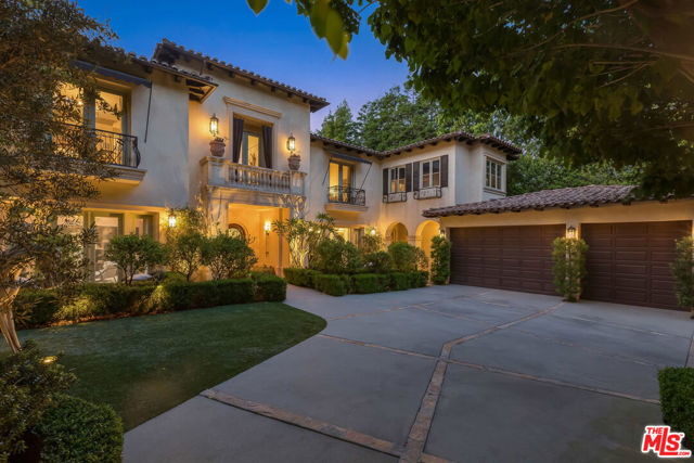 12094 SUMMIT Circle Beverly Hills, California Privacy, elegance and quality set behind the guarded gates of The Summit in Beverly Hills. The former celebrity Mediterranean Villa sprawls 7,453sf of immaculate architecture and design. Style and sophistication is realized as the front door opens to the grand entry with soaring ceilings and stone floors. High class accommodations throughout including 6 bedrooms, 7 bathrooms, a large family room, living room, chefs kitchen, theatre, office and a separate maids quarter. Each downstairs room opens to the backyard complete with lush landscaping, manicured gardens, a fire feature, custom pool and spa. 12094 Summit Circle is both an entertainers vision and a private retreat.