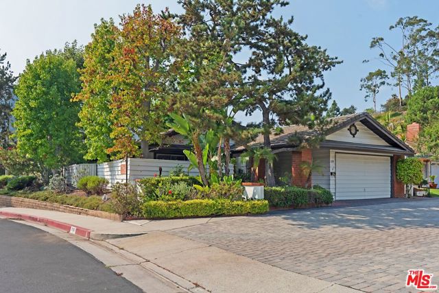 17197 Avenida De Santa Ynez Pacific Palisades, California First time on the market, this former 'model home' sits on an over-sized corner lot and features an amazing indoor/outdoor flow. Filled with lots of natural light & serene mountain views, this home oozes good vibes. Front/side/rear patios and a large grassy backyard with many fruit trees enhance the enjoyment of the surrounding beauty. 3-bedrooms/3-baths including a spacious primary suite with walk-in closet, dual sinks & a sunken tub/shower with skylight. The eat-in kitchen has an excellent footprint and features a center island. The combined living & dining rooms provide ample space to entertain and both lead to the outdoors. Large 2-car garage, dedicated laundry room, front courtyard entry and access to the Santa Ynez Rec. Center w/ pool/spa/gym/tennis/clubhouse/kid's playground complete this residence. Outstanding potential, wonderful opportunity awaits the buyer of this 'very special property.'