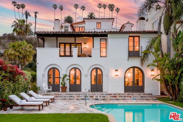 1020 Palisades Beach Road Santa Monica, California We are proud to present Villa del Sol, a stunning Spanish Colonial Revival designed by John Byers & built by Eric Barclay in 1928 for silent film star Constance Talmadge. Take a step off PCH & experience the courtyard entrance, greeted with bursts of colorful decorative Spanish tiles lining the fountain & floors, reminiscent of a Moroccan riad. The Spanish tiles serve as beautiful accents throughout the home & exterior while exposed beams, crown molding & French doors elegantly contribute to the airy, coastal vibe. The 6,485sf villa boasts 7 bedrooms (2 masters, 1 with a 13ft exposed beam hip ceiling), 6 bathrooms (including a copper bathtub) and a versatile, spacious 850sf media room. Villa del Sol spans 3 stories with a 2-car garage plus a 40ft in-ground pool & fire pit in a 2,800sf backyard that spills directly onto the beach. The house comes with RTI plans (available upon request) to build an 8,239sf Minimalist Desert Modern home with a sleek, natural concrete facade & interior finishes that perfectly complement throughout. Thoughtful layout features include a spacious ensuite master bathroom with a standalone bathtub directly under a skylight & the entire west facing side of the home consisting of floor to ceiling windows guaranteeing prime views of oceanfront sunsets.