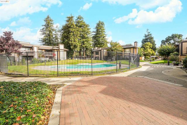 Surrounding community featuring a pool