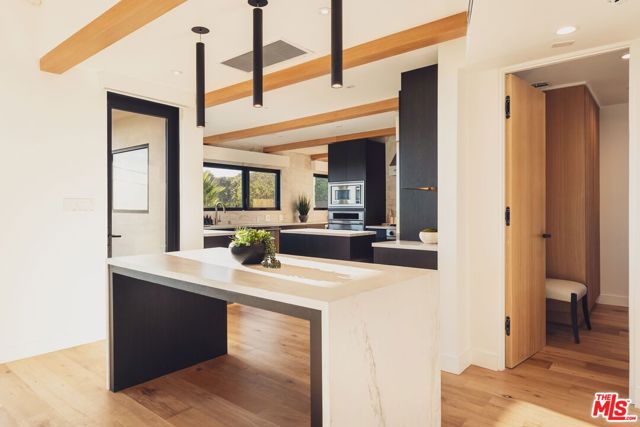 Drew Fenton | 1235 N Kenter Avenue Los Angeles CA | MLS: 7439365