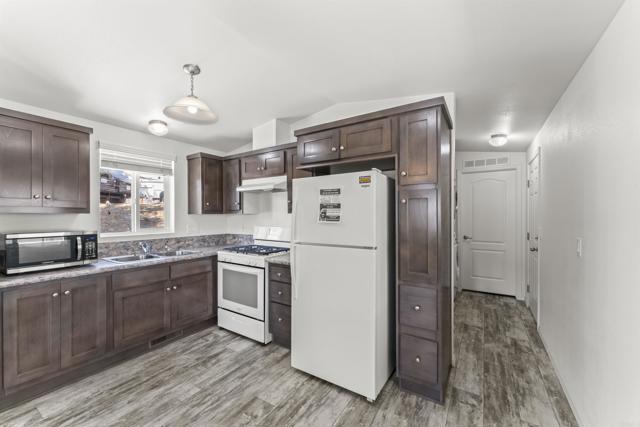 12044 Royal Road, El Cajon CA: https://media.crmls.org/mediaz/4c16c409-1488-4e32-9efc-9e7bcf9b1f0a.jpg