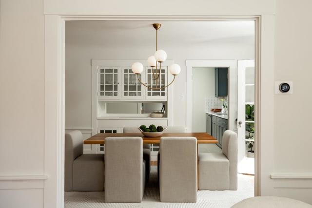 Dining room with original hutch and delightful chandelier
