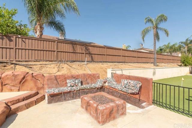 Built in seating near pool area daytime