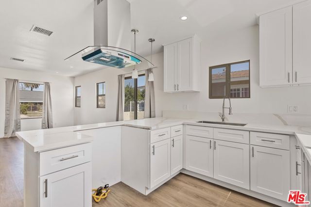 1622 W 66th Street, Los Angeles CA: https://media.crmls.org/mediaz/4edf7d84-0e58-4d03-bc83-4f089859f893.jpg