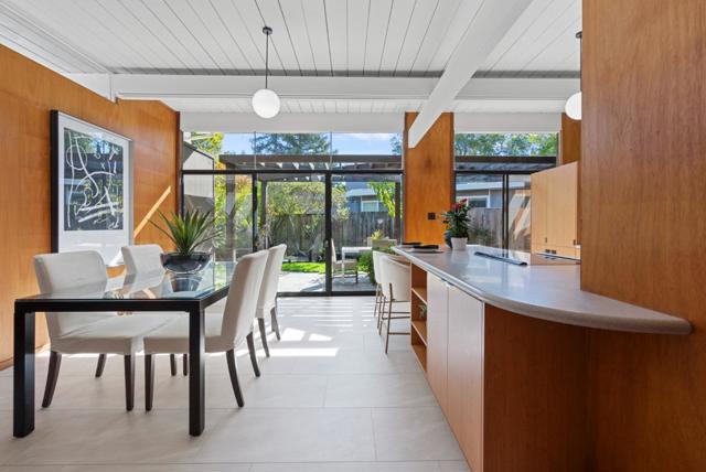 Dining Room View To Pergola Patio & Kitchen