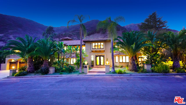 1345 Moraga Drive Los Angeles, California Stunning Contemporary Mediterranean Estate in the exclusive 24-hour guard gated community of Moraga Estates in Bel-Air. This 8,931 SF turnkey home has been completely reimagined and is situated on over 1.5 acres in a 100% completely private setting surrounded by gorgeous mountain views. The outdoor living area is spectacular! Offers massive entertaining space with a championship size tennis court and full lighting system, pool, spa, outdoor kitchen, BBQ, outdoor dining area. This home features 7 bedrooms, 9 baths, an open floor plan with high ceilings, custom designed movie theater with wet bar, 2 separate offices, gourmet kitchen, formal dining room, oversized family room/screening room, 4 balconies, 4 fireplaces. Master suite includes separate sitting area/office with fireplace, terrace overlooking the backyard, spa-like bath, walk-in closet. Property offers ultimate privacy & exceptional security in this gated community with only 33 estate residences. A truly move in ready hideaway!