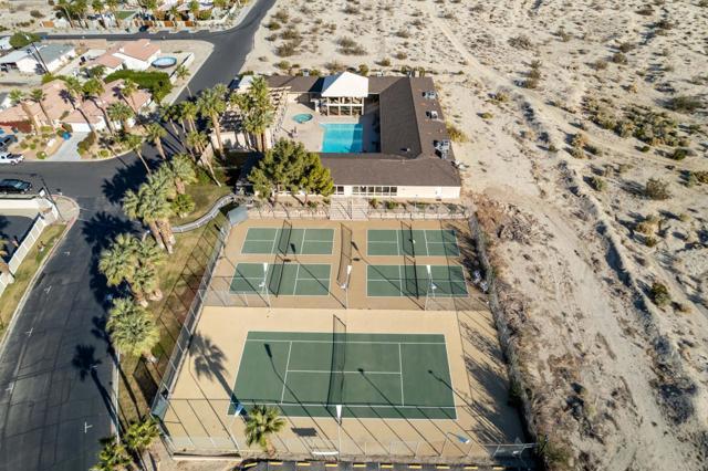 aeriel view of pool and tennis