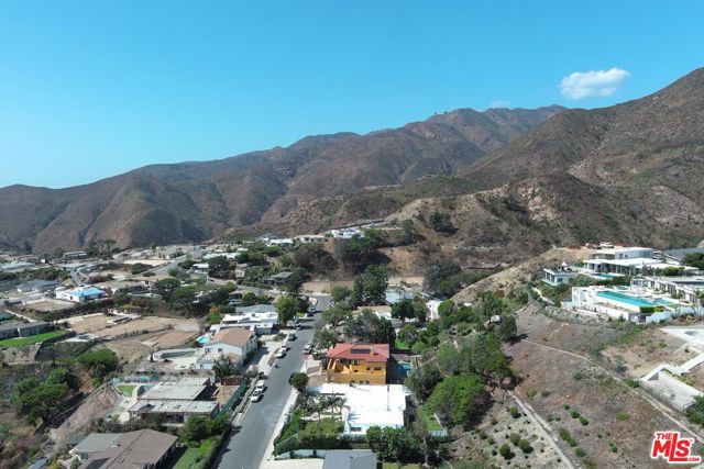 Drew Fenton | 18073 Sandy Cape Drive Pacific Palisades CA | MLS: 7432418