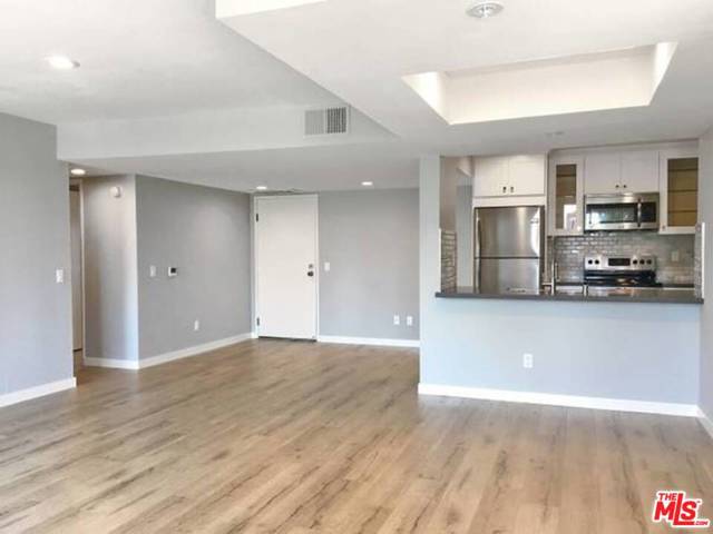 1840 N KENMORE Avenue 101 Los Angeles, California *PLEASE SEE PRIVATE REMARKS BEFORE CALLING LA1!* GORGEOUS UNIT IN A GREAT LOOKING BUILDING IN AN EXCELLENT LOS FELIZ LOCATION! THIS STUNNING UNIT FEATURES LUXURIOUS AMENITIES INCLUDING GREAT VIEWS, NEWER CABINETS, HIGH END QUARTZ COUNTERTOPS, STAINLESS STEEL APPLIANCES, DESIGNER KITCHEN BACKSPLASH, BEAUTIFUL FLOORING, RECESSED LIGHTING, HIGH CEILINGS, CENTRAL A/C, WALK IN CLOSET, GATED PARKING, LARGE BALCONY, PLENTY OF NATURAL SUNLIGHT AND MORE! TRULY A MUST SEE! COMMON AREA AMENITIES INCLUDE A ROOFTOP DECK WITH BBQ AND FITNESS CENTER WITH STATE OF THE ART EQUIPMENT! *PHOTOS MAY BE OF A SIMILAR UNIT IN THE BUILDING*