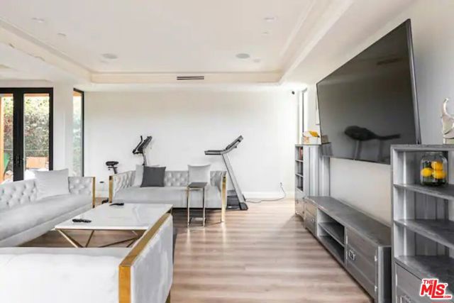 Spacious living room with plenty of seating area