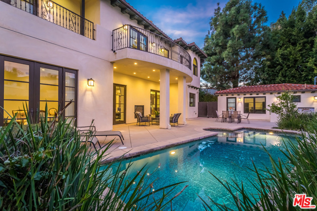 238 N Rexford Drive Beverly Hills, California PRICE IMPROVEMENT! Newly constructed in 2015, this extraordinary modern-Mediterranean residence showcases masterful craftsmanship, blending timeless sophistication with contemporary design. This home is on one of the largest Beverly Hills lots south of Santa Monica Blvd! Situated over an expansive 4,586 sqft, the first floor boasts a 2-story foyer, formal living room, dining room and a large chef's kitchen with top of the line appliances. An indoor-outdoor floor plan offers multiple sets of French doors that lead out to a lush, landscaped backyard complete with heated pool, spa, fireplace, outdoor kitchen, and a large, separate guest house with private exterior entrance. Upstairs, 4 en-suite bedrooms await including a master suite with his/hers dressing rooms and an exquisite master bath with high pressure steam shower. Located north of Wilshire in the heart of Beverly Hills' Platinum Triangle, the best of Beverly Hills shopping and dining is wonderfully walkable, offering the best of the City at your doorstep! Incredible Value in highly coveted 90210!