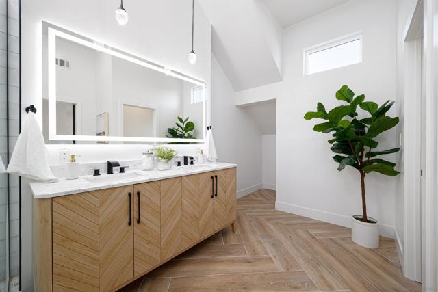 Primary bathroom with huge shower and claw tub combo with 70inch double vanity and LED mirror