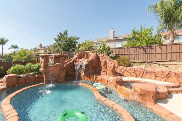 Waterfall of lazy river and pool