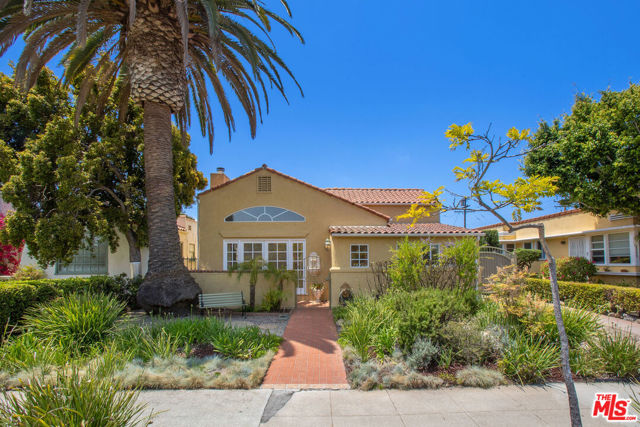 2204 23Rd Street Santa Monica, California The beautiful alluring front porch leads you into the formal entry of this charming classic Spanish home with plenty of windows for natural sunlight. Perfect for entertaining, relaxing, and working from home. The bold living room has French doors, hardwood floors, a fireplace, and a high ceiling next to the dining room with a nearby main bedroom featuring a connecting bathroom with a fun shower with skylight and a seating area that could be used as a den or nursery. Hardwood floors throughout the house. Large kitchen adjacent to a spacious laundry room, that flows into a private covered rear patio and lovely backyard perfect for outdoor grilling and entertaining. There is a large detached two-car garage with its attached bonus room great for work from home, playroom, art studio, you name it Live the sustainable Santa Monica lifestyle with so much nearby. Enjoy the neighborhood, close to Virginia park, farmer's market, & eateries/shops on Pico. Home is calling you, LIVE WHO YOU ARE