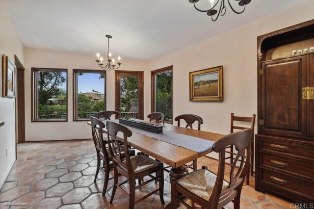 Formal dining room offers a serene oasis for all-day enjoyment