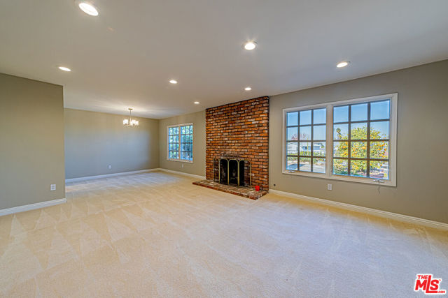 LIVINGROOM WITH A FIRE PLACE