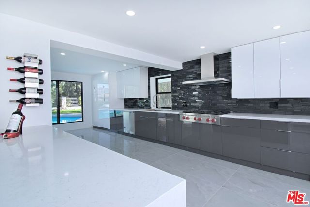 12112 Woodley Avenue, Granada Hills CA: https://media.crmls.org/mediaz/54347dcf-e15b-41f1-ac3e-23658d3cb6bd.jpg