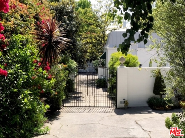 137 S Burlingame Avenue Los Angeles, California Development opportunity on this Beautiful Prime Brentwood Park Estate! Gated with utmost privacy, the lot is 16,807 SF with 2500 SF of useable frontage. Charming 3BR, 3BA existing original home being rented monthly plus additional exterior 1 BR/BA. Updated Kitchen, Living & Dining rooms have cozy fireplaces and hardwood floors. Private yard with lush surroundings and a pool & room for sport court! Carport, plenty of room for parking.