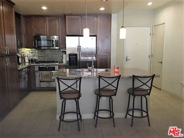 21301 ERWIN Street, Woodland Hills CA: https://media.crmls.org/mediaz/56352d9d-c1d3-45de-a0e2-ee0e773f397b.jpg