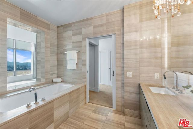 900 W Olympic Boulevard, Los Angeles CA: https://media.crmls.org/mediaz/563b03ab-acac-4b24-87a5-35bed39b1c80.jpg