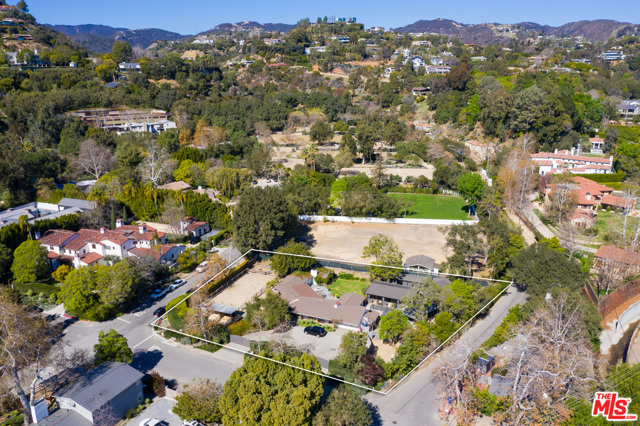 13181 Riviera Ranch Road Los Angeles, California What began in 1946 as a ranch style retreat from the city by famed architect Cliff May has remained a coveted escape, now graced by stately oaks and sycamores. This stunning flat lot boats an original Cliff May ranch house with 2 bedrooms and 2.5 baths. The property also features stables, and a private riding arena. A circular driveway leads to the home, nestled behind mature trees. Bring your ideas to remodel or build your dream home. A truly exceptional location, away from the hustle and bustle of the city but close to every convenience. A must see for the buyer looking for a rustic masterpiece in the heart of Brentwood.