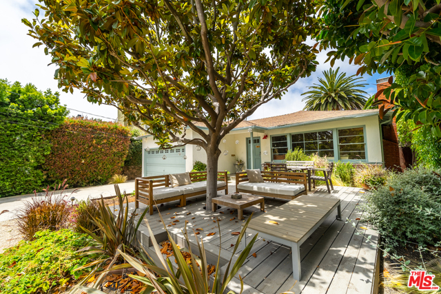 1215 Carlton Way Venice, California Fresh and breezy vibes abound in this hip 2 BD + 2 BA Venice home. Situated off a quiet side street, the welcoming front yard with a large deck and mature landscaping offer privacy for al fresco entertainment or lounging. The cheerful interior features large paneled windows, a spacious flex room open to the kitchen, wood floors, and charming vintage details throughout. A lush backyard provides a second outdoor space, complete with a hot tub. Move-in as-is or modernize, the possibilities are endless. Located in a lovely residential neighborhood, just blocks from Superba Food + Bread, Deus ex Machina, and shops/eateries on Lincoln Blvd.