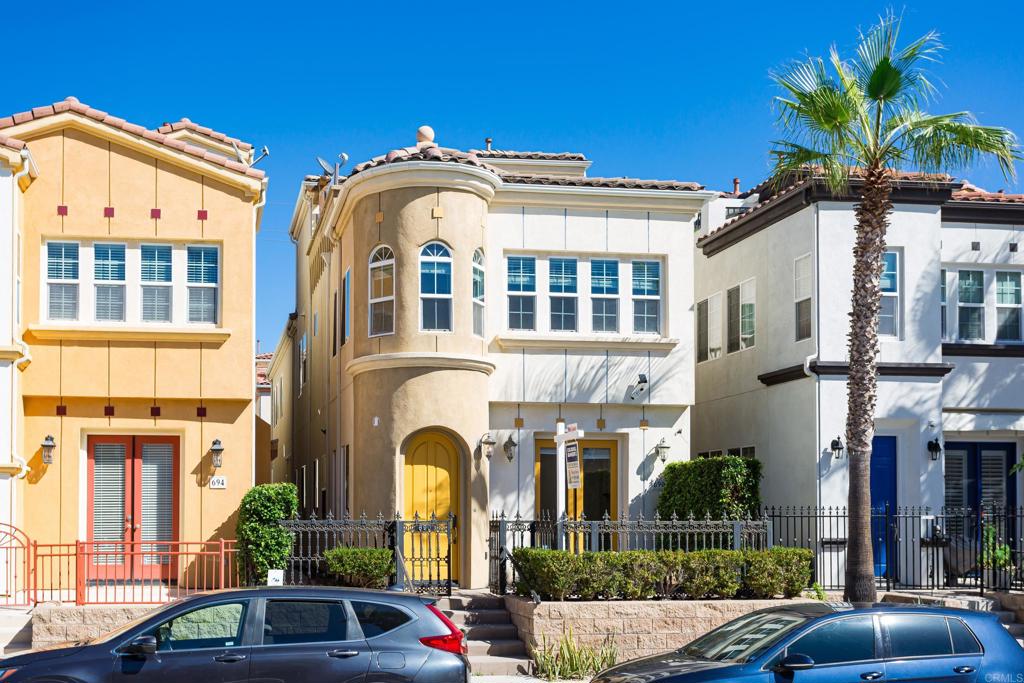 Walk or bike to the beach!! Beautiful townhome 3bd with option top deck bedroom that could be used as 4th bedroom or bonus room. Direct access to deck with ocean views. Large two car garage! Parking in front of property.  Walk to downtown to enjoy amazing restaurants, movie theatre, bus station and much more! Call now to schedule a showing!!