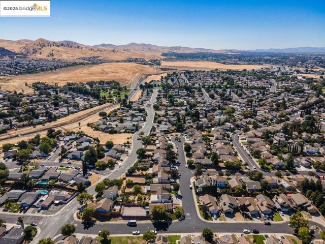 View of property location with nearby suburban area and a mountain backdrop