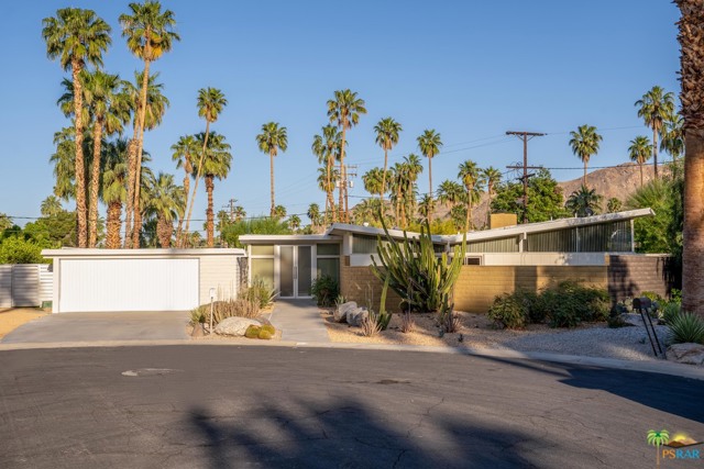 1860 S Aquanetta Circle Palm Springs, California A rare 1957 Krisel-Palmer, built by the Alexander Construction Company in the Twin Palms Estates neighborhood of South Palm Springs is now available. Twin Palms Estates was Coachella Valleys first George Alexander Construction Company subdivision, originally dubbed Smoke Tree Valley Estates. This successful subdivision was designed by Bill Krisel with Dan Palmer, 90+ homes were designed in three stages, the first two being Twin Palms Estates, the third, 19 homes in the middle of the adjacent El Camino Estates. 1860 Aquanetta Circle is situated on a quiet cul de sac, with 180-degree mountain views. This classic Krisel-Palmer 3-bedroom, 2-bath home, in essentially original condition features a butterfly roof with post and beam construction and its original bleached wood ceiling. An 1,805 SF interior boasts a wood burning fireplace in the living room, clerestory windows throughout, sliding glass doors in good working condition, original extra tall aluminum and glass double entry doors, carport conversion to garage, and so much more. With only two previous owners, this Krisel-Palmer will satisfy midcentury modern purists who want a mostly original pedigreed property or midcentury modern enthusiasts wanting to put their own stamp on it.The house sits on a 11,761 SF lot with mature fruit trees, a rear and two large side yards and pool. Come see why Twin Palm.