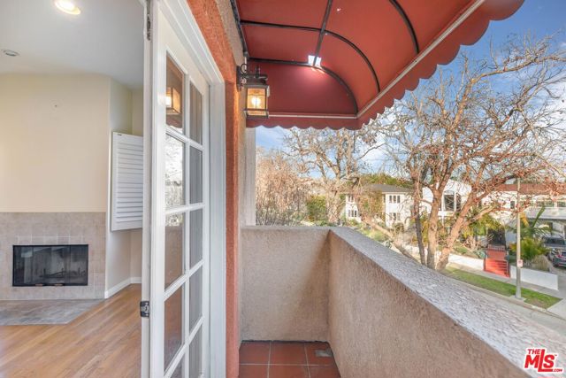 1073 S Mansfield Avenue, Los Angeles CA: https://media.crmls.org/mediaz/5785e077-7cfa-4b2e-8b0d-29a2a412a448.jpg