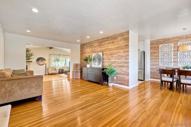 Welcome Home! View from the Front Door...check out the beautiful WOOD Floors and Custom WOOD Walls!