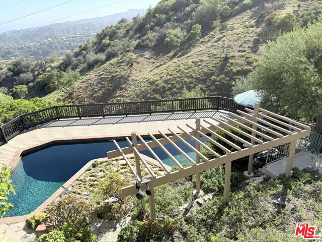 1475 N Kenter Avenue, Los Angeles CA: https://media.crmls.org/mediaz/5792f0fe-2bbe-4f06-ace2-807df2b1f40a.jpg