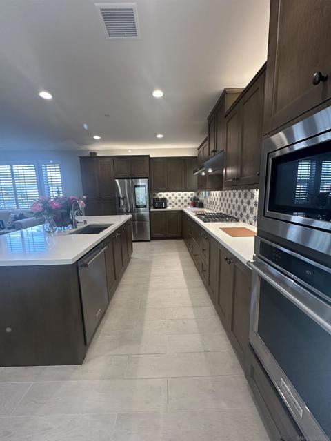 751 Merit Dr, San Marcos CA: https://media.crmls.org/mediaz/58012581-b332-4b0b-b975-963b7fcc030f.jpg