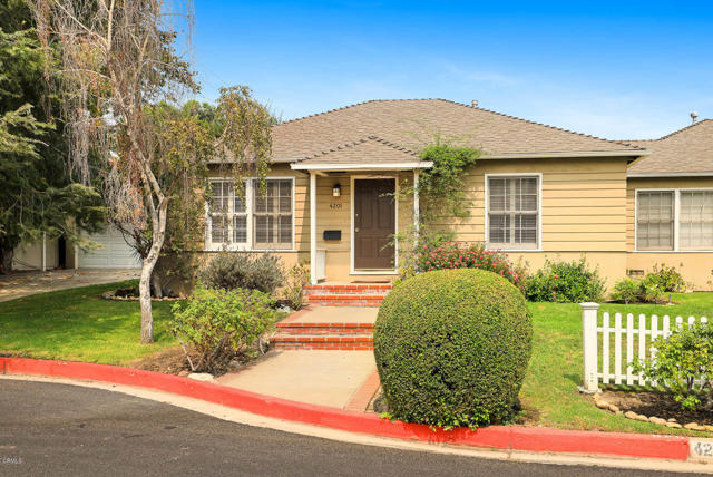 4201 W Toluca Lake Lane Burbank, California Opportunity to live in a great neighborhood conveniently located near Warner Brothers, NBC, Disney Studios, Universal City and 101, 170 and 134 freeways. This Toluca Lake adjacent home is minutes away from local retailers, numerous restaurants and situated in a serene neighborhood surrounded by manicured landscaping. It has 2 bedrooms, 1 full bath, a grassy front yard, a large backyard and a private 2 car garage. It is a bright, light filled home with a spacious living and dining room with hardwood floors throughout, crown moldings, and plantation shutters. The eat-in kitchen has a stainless steel refrigerator, gas stove/oven, stone floors and countertops. The bathroom has a separate tub and shower. Other amenities include central air/ heating and washer/ dryer.