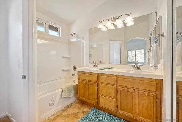 Dual vanities, a separate room for the toilet, brand new tub/shower combo and a walk in closet.  All the fixtures including angle stops are new!