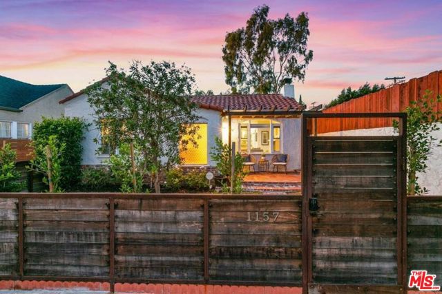 1157 Van Buren Avenue Venice, California Solar powered and Eco friendly in Venice Beach. Classic 1920's character Spanish was recently updated with modern sophistication. Green features include: 100% solar, tankless water heater, LED lighting, energy-efficient central heating, and upgraded electrical, plumbing and flooring. Stunning kitchen opens to the living rooms with 100 year old marine wood-burning fireplace. This amazing charmer also features a finished garage that was most recently used as home/work office. Wonderful outdoor living and dining spaces, built-in BBQ, original brick accents, dreamy entertaining possibilities. Just blocks from Abbot Kinney, and the best of the beach lifestyle.