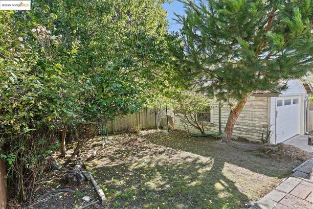 View of yard featuring a garage