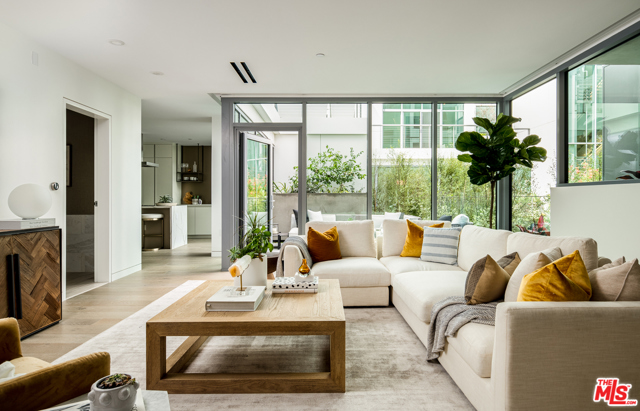 8600 Wilshire Boulevard Garden 10 Beverly Hills, California Garden Residence 10 is centered around the outdoor living experience, with a thoughtful balance between tall windows and gallery walls fit for an extensive art collection. Configured generously on a single level, this residence boasts three bedrooms and ample space for dining and entertaining. Featuring open-plan living and unobstructed spaces, this Garden Residence transitions effortlessly from its interior to its private terrace which opens onto the courtyard. The home features direct lift access to a private entry foyer from the lobby and subterranean parking garage, chef-caliber kitchen with Miele appliances, Snaidero cabinets and stone countertops; luxurious bathrooms with premium fixtures and radiant floor heating; a striking contemporary design and thoughtful details that surprise and delight at every turn. Less than one mile from the famed Golden Triangle, Gardenhouse, a new boutique development in Beverly Hills, places owners within arms reach of the very best that Beverly Hills has to offer including Michelin Star restaurants, exceptional shopping and entertainment, as well as a leading school district. Walking distance to an abundance of convenient amenities such as Restaurant Row, Melrose Place, La Cienega Design Quarter, SLS Hotel, The Beverly Center and more, Gardenhouse is at the epicenter of luxury.